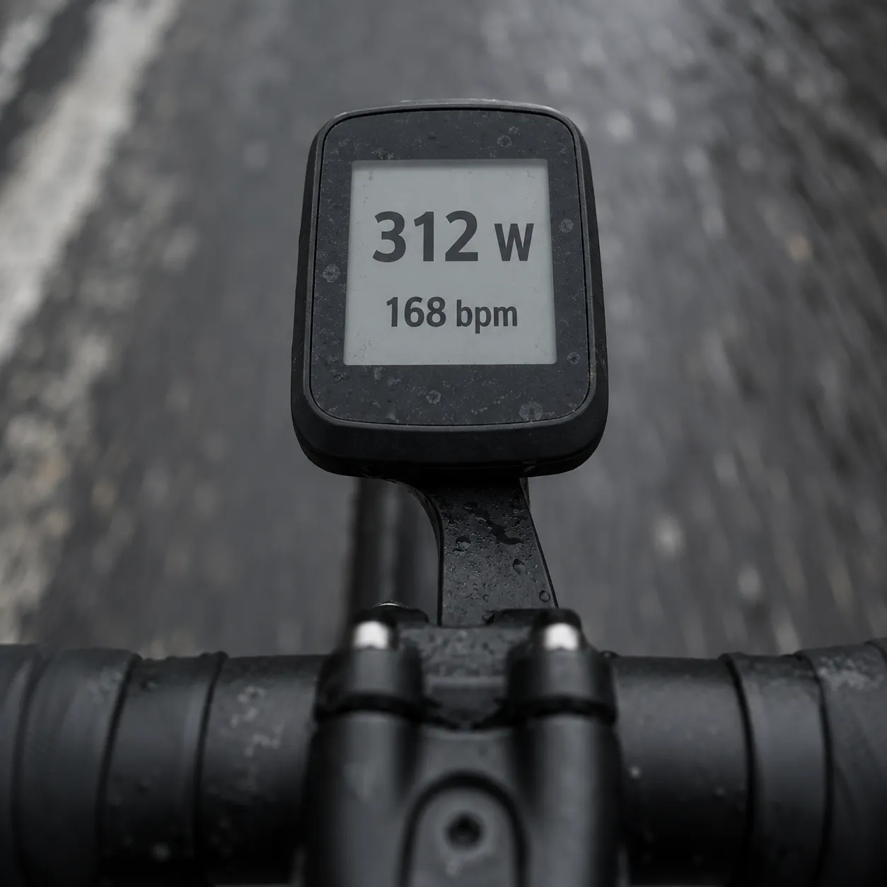 Handlebar head unit reading 312 watts and 168 beats per minute